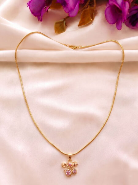 Heart with bow pendant necklace